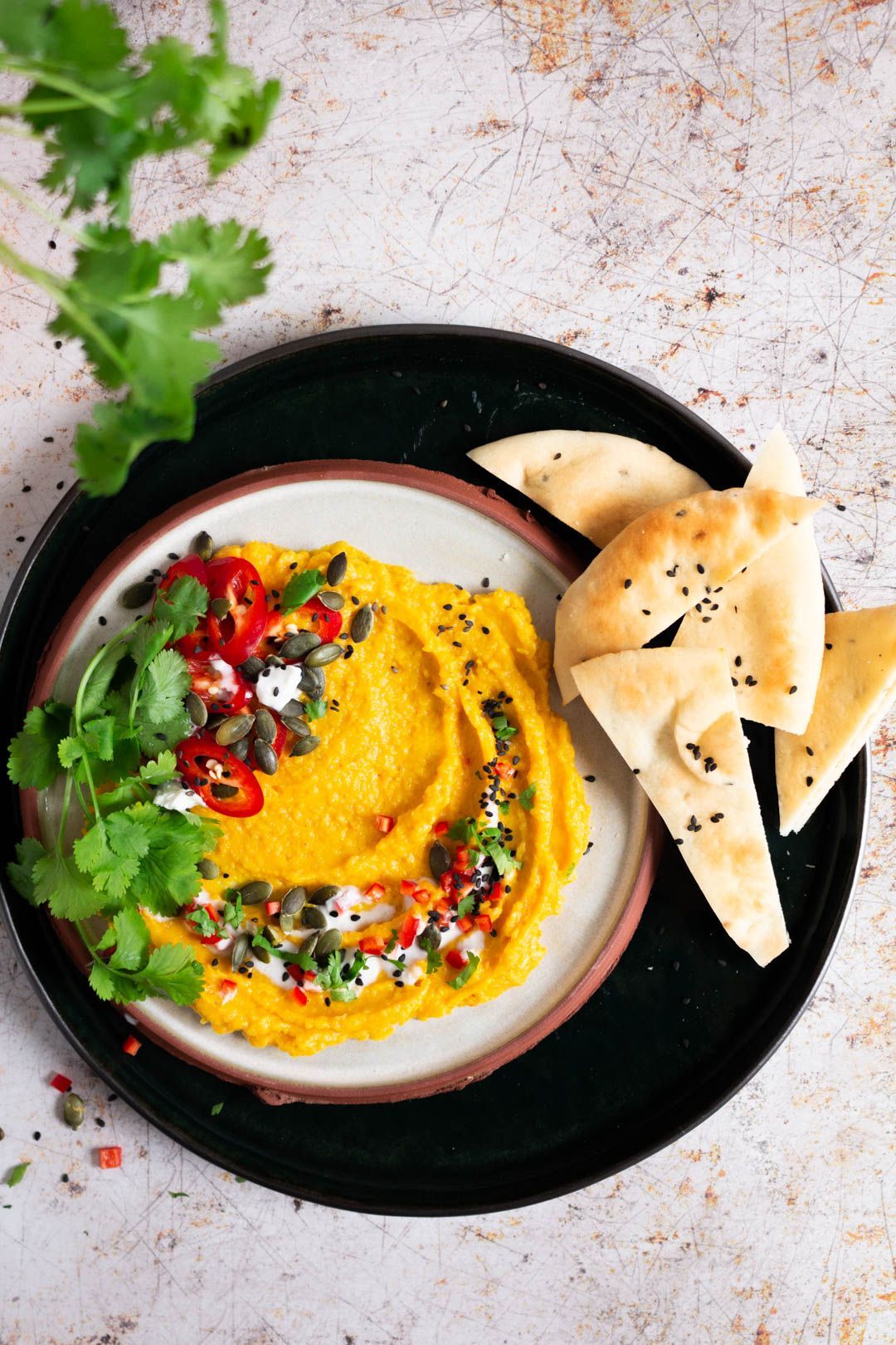 Dip van pompoen met mango en kokos
