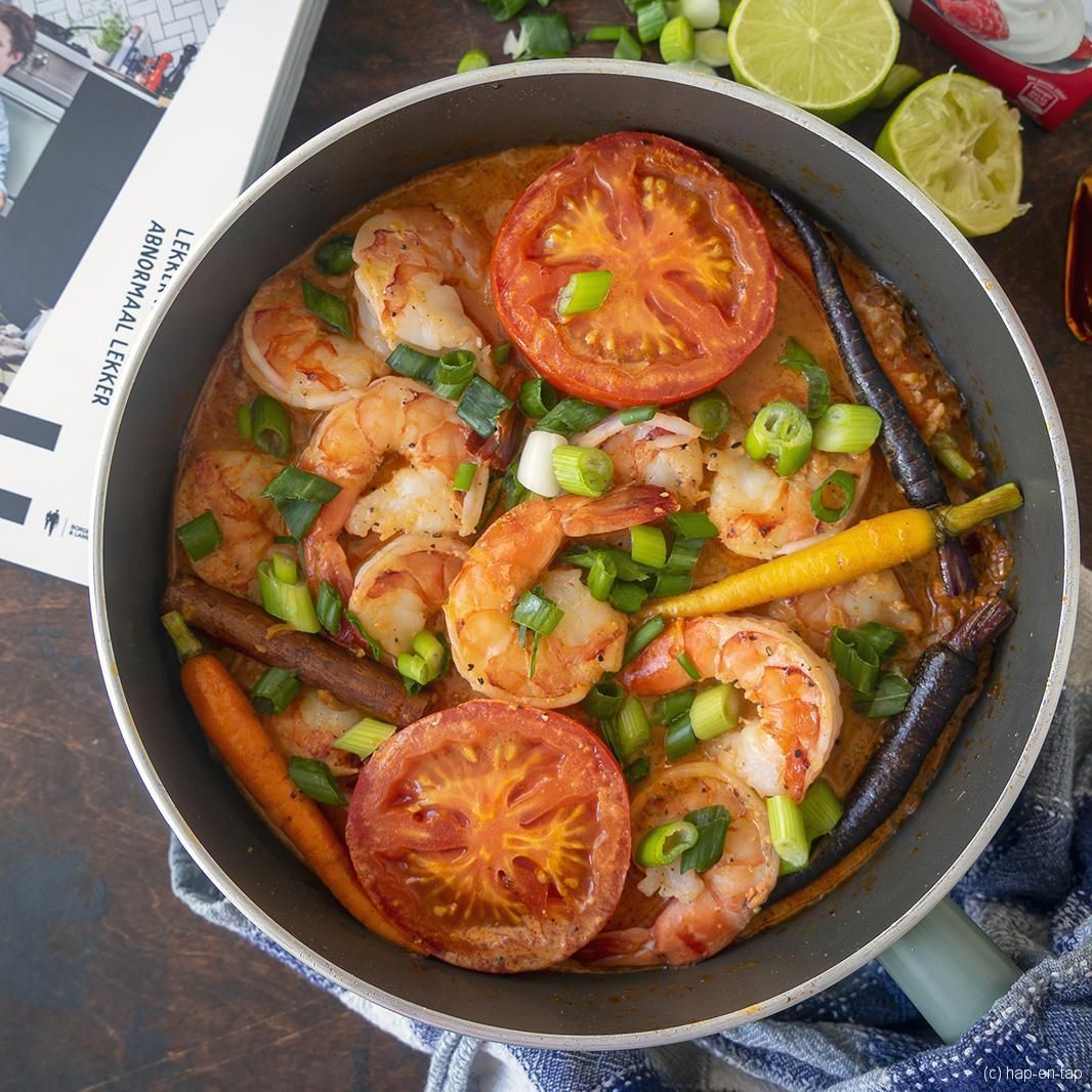 Scampi in whiskey met geroosterde tomaat