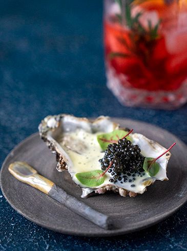 Oester met witte chocolade en kaviaar