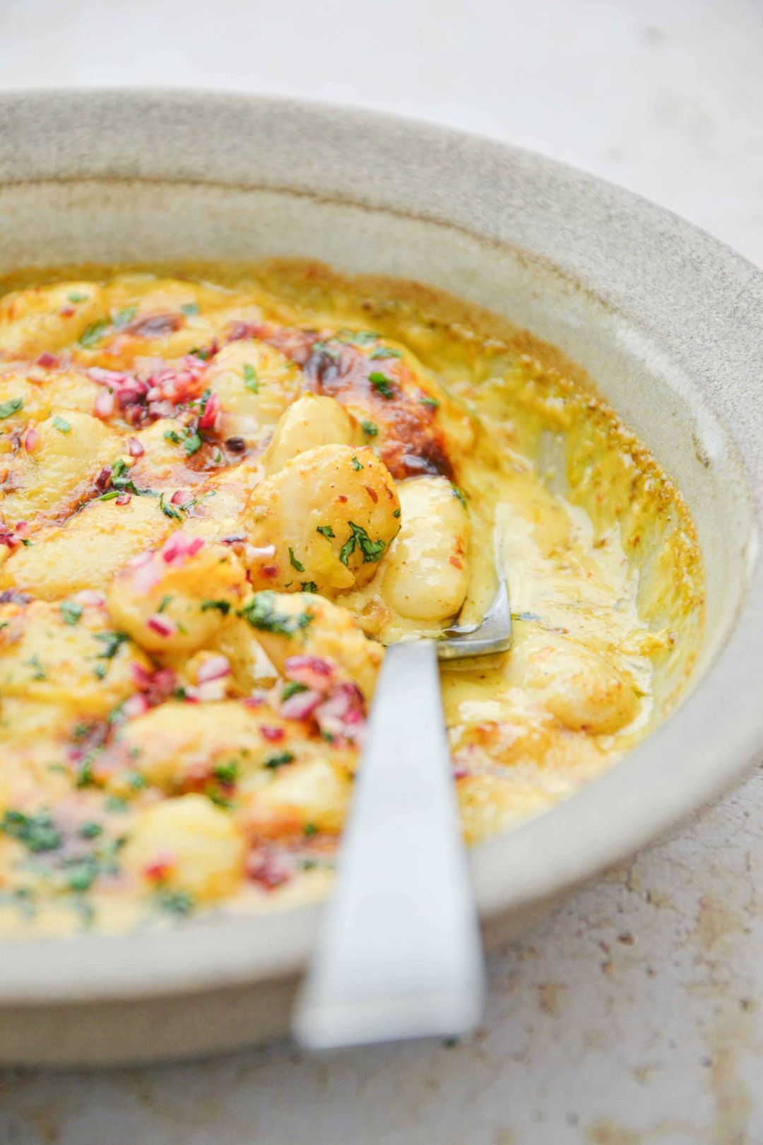 Reuzebonen gegratineerd met cheddar en curry